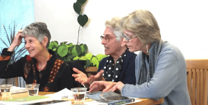 From left, the author, poet Hilda Raz and novelist Lynn C. Miller